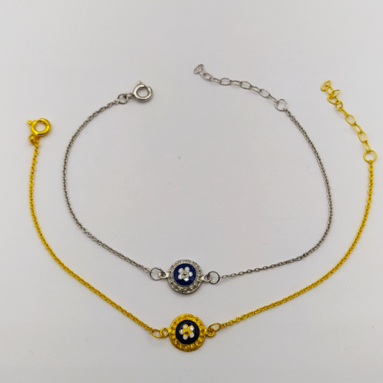 PULSEIRA PRATA DOURADA E RODEADA